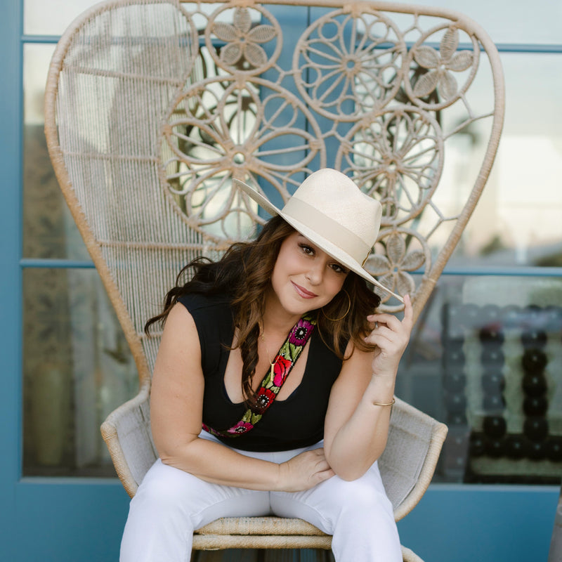 Elegant Cynthia Toquilla straw hat with twist crown and flat brim for sun protection