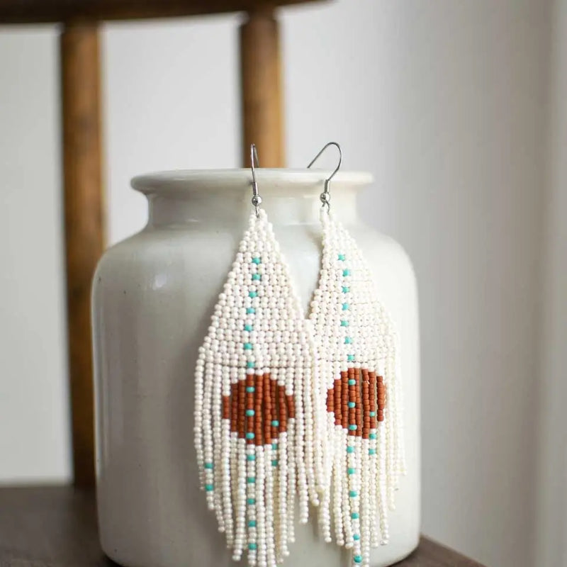 Handmade Guatemalan beaded earrings in white and teal and red, a bold addition to any wardrobe