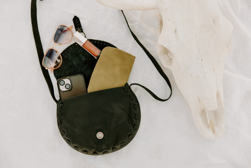 Sustainably produced Vida saddlebag, perfect for essentials with exterior zipper pouch