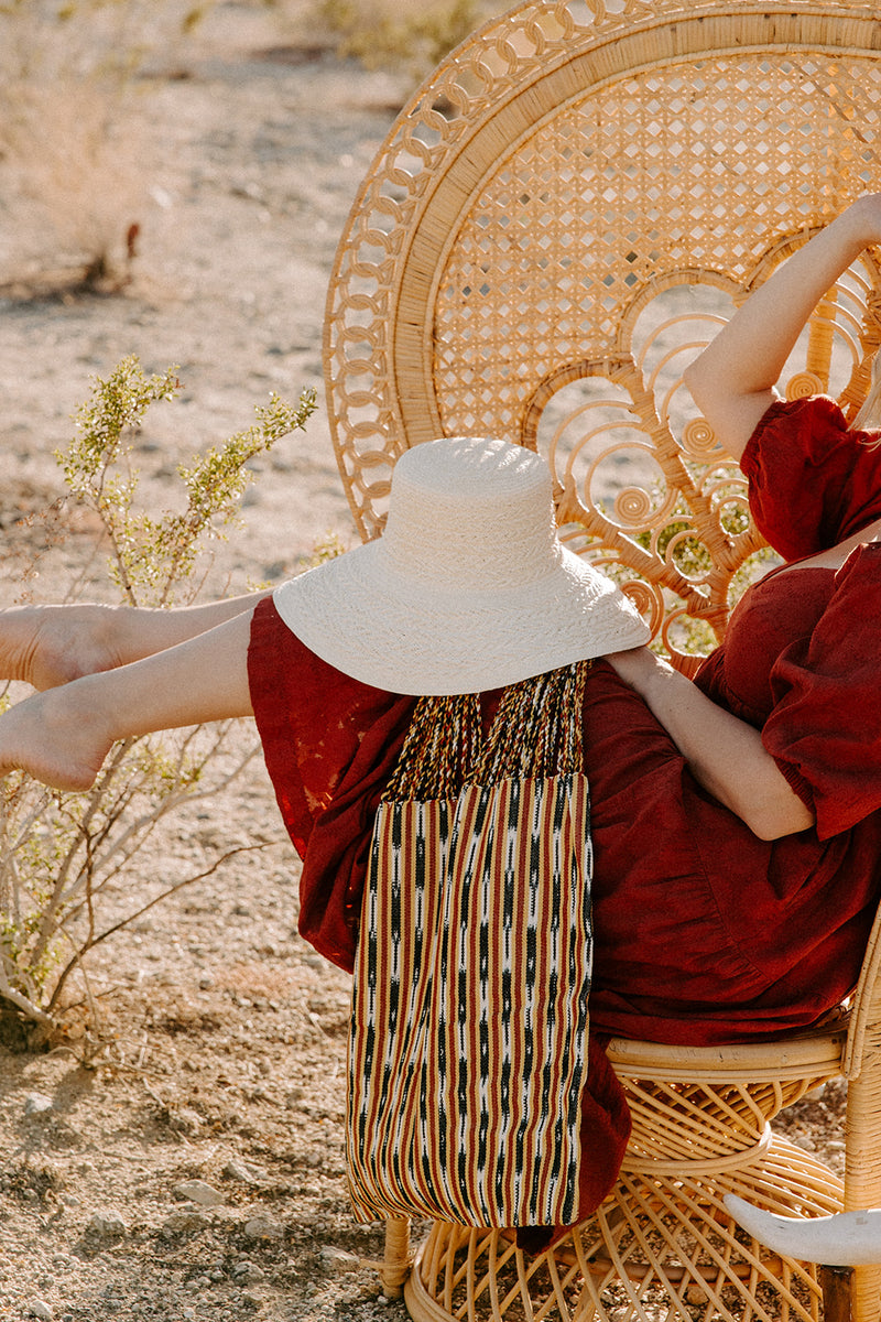 Luxurious Alicia bucket hat in toquilla straw, showcasing superior craftsmanship and biodegradable materials from Sol Authentica